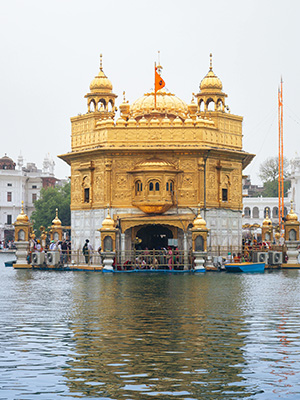 Devotees on a spiritual pilgrimage to a holy temple in the Himalayas – JSBT Holidays